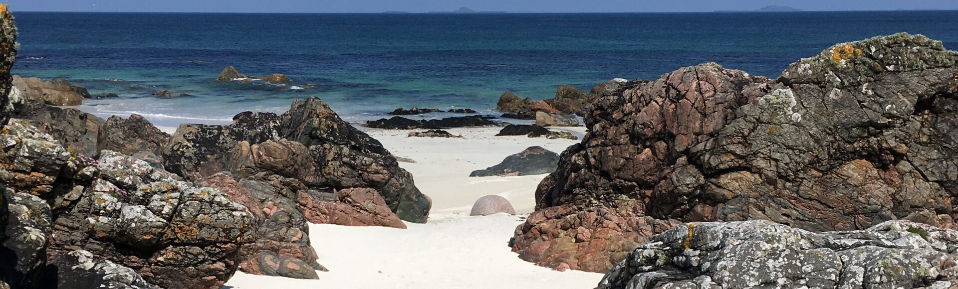 https://www.hebrideanadventures.co.uk/wp-content/uploads/2024/10/Iona-beach-e1527602259913-scaled-e1747084723488.jpg