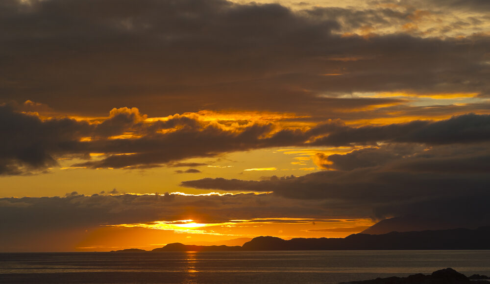 https://www.hebrideanadventures.co.uk/wp-content/uploads/2024/10/Sunset-Skye-Sleat.jpg